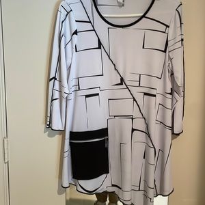 Sophisticated styling in this adorable top